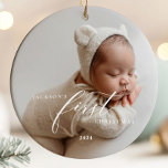 Elegant White Script Baby's First Christmas Photo  Ceramic Tree Decoration<br><div class="desc">Celebrate your baby's first Christmas with this elegant and timeless photo ornament, featuring the text "Baby's First Christmas" where you can add a custom name. With it's classic design this keepsake will hold cherished memories for years to come. Perfect as a gift for new parents or to add a special...</div>