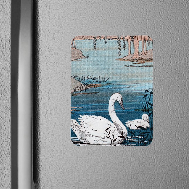 Elegant White Swan With Baby Magnet (Pretty white swan with baby swimming in blue lake on rectangular magnet.)