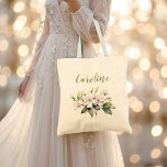 Elegant White Watercolour Apple Blossom name Tote Bag<br><div class="desc">This elegant white watercolour apple blossom design features delicate magnolia flowers with soft green leaves, paired with stylish cursive text to add any name. Perfect for adding a touch of romantic sophistication to bridal party gifts or special occasions like weddings. The subtle pastel tones evoke springtime freshness and timeless charm,...</div>