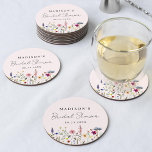 Elegant Wildflower Meadow Blush Pink Bridal Shower Round Paper Coaster<br><div class="desc">Elegant floral bridal shower paper coasters featuring a bottom border of watercolor wildflowers and foliage in shades of pink, yellow, purple, blue, and green on a blush pink background. Personalise the wildflower bridal shower coasters with the bride-to-be's name and the date. The personalised wildflower coasters are perfect for spring and...</div>