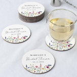 Elegant Wildflower Meadow Bridal Shower Round Paper Coaster<br><div class="desc">Elegant floral bridal shower paper coasters featuring a bottom border of watercolor wildflowers and foliage in shades of pink, yellow, purple, blue, and green on a white background. Personalise the wildflower bridal shower coasters with the bride-to-be's name and the date. The personalised wildflower coasters are perfect for spring and summer...</div>