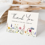 Elegant Wildflower Meadow Cream Bridal Shower Thank You Card<br><div class="desc">Celebrate love and gratitude with our enchanting Elegant Wildflower Meadow cream bridal shower thank you card. Delicately crafted with vibrant hues of pink, yellow, purple, blue, and green, a lush array of wildflowers and foliage adorn the bottom, evoking the freshness of spring and the warmth of summer. "Thank You" is...</div>