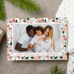 Elegant Winter Floral Photo Holiday Card<br><div class="desc">Elegant Christmas photo card featuring your horizontal photo framed in white with a background pattern of winter flowers and foliage in shades of pink, green, mauve, and blue. Personalise the front of the floral Christmas card with a custom greeting and your family name. The photo Christmas card reverses to display...</div>
