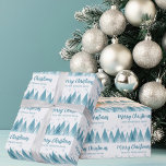 Elegant Winter Trees Custom Blue Merry Christmas Wrapping Paper<br><div class="desc">An elegant row of winter fir trees and snowflakes above your personalised Merry Christmas script and your family last name in pretty blue below the snow filled forest. A modern holiday design with your custom message on lovely wrapping paper.</div>
