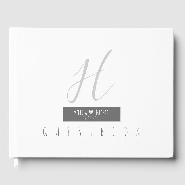 elegantly bride groom monogrammed white wedding guest book (Front)