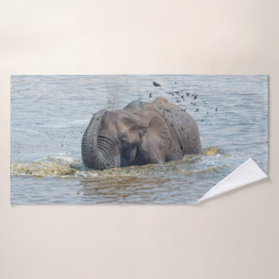 Elephant enjoying a bath towel set