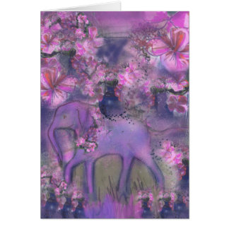 Elephant garlanded with pink flowers