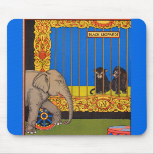 elephant strolling past the black leopards cage mouse pad