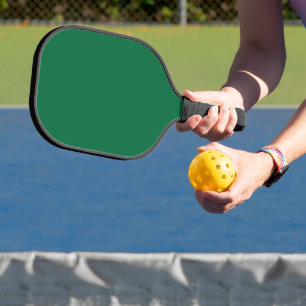 Elevate your Web Design with a Green Background Pickleball Paddle