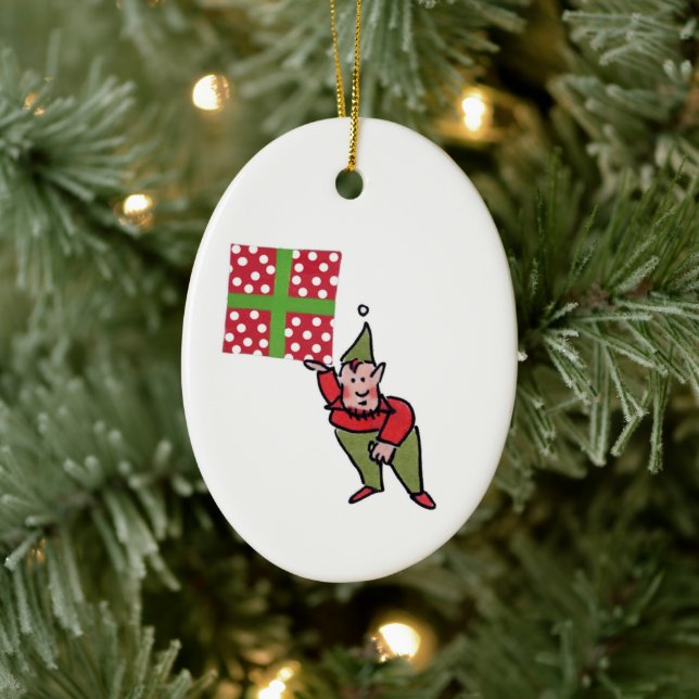 Elf With Polka Dot Gift oval ceramic ornament (Tree)