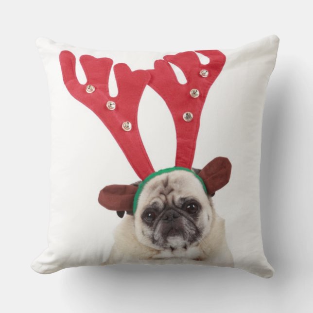 Embarrassed looking Pug wearing Reindeer Antlers Cushion (Front)