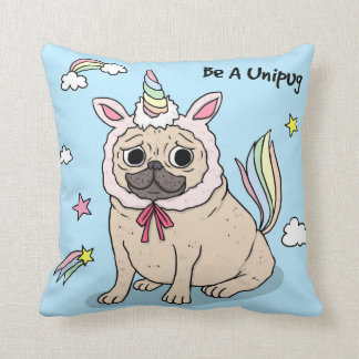 Embarrassed Pug with Unicorn Hat on Cushion