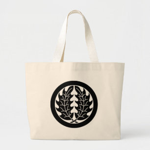 Embracing holly leaves in circle large tote bag