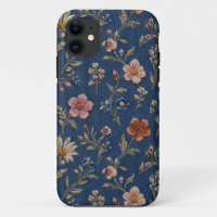 Embroidered plain wildflowers on denim background