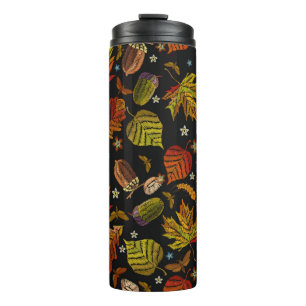 Embroidery art. Autumn seamless pattern. Leaves, a Thermal Tumbler