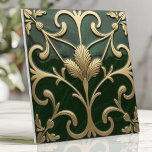 Emerald and Gold Art Nouveau Floral Tile<br><div class="desc">Bring elegance and sophistication to your space with this deep emerald and gold Art Nouveau-inspired design. Featuring flowing organic floral and vine patterns, intricate metallic accents, and stylised botanical curves, this piece exudes vintage charm. The slightly raised embossed elements and swirling details create a timeless and luxurious aesthetic, perfect for...</div>