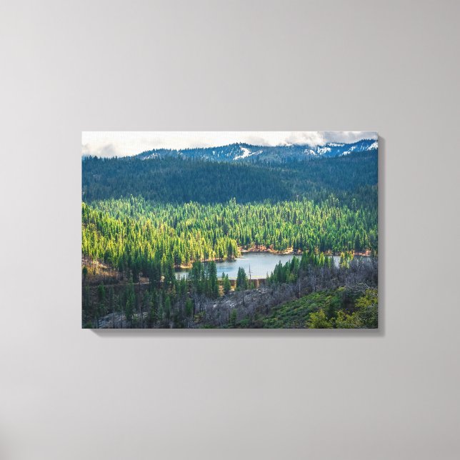 Emerald Basin Beneath Mountain Clouds Canvas Print (Front)