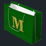 Emerald Green & Gold Modern Letter Monogram Large Gift Bag<br><div class="desc">Stylish and modern gift bag featuring a bold monogram design. Perfect for any occasion — weddings,  birthdays,  or special celebrations. Personalise it with your own initial and colour for a touch of elegance and charm.</div>