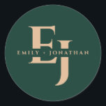 Emerald green monogram couple names fall wedding  classic round sticker<br><div class="desc">Add a touch of personalised elegance to your fall wedding with our Emerald Green Monogram Couple Names Classic Round Sticker. Designed to seamlessly blend sophistication with the rich hues of autumn, this sticker features a classic round shape adorned with a striking emerald green colour and a custom monogram, perfect for...</div>