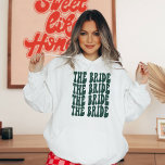 Emerald Green Trendy Groovy Disco Bride Custom Hoodie<br><div class="desc">Are you planning the perfect bachelorette party for your soon-to-be bride? Well, this personalised emerald green hoodie sweatshirt is just what you need! Not only does it look great, but it will also come in handy during the rehearsal dinner and wedding day. Plus, who doesn't love a good bridal party...</div>