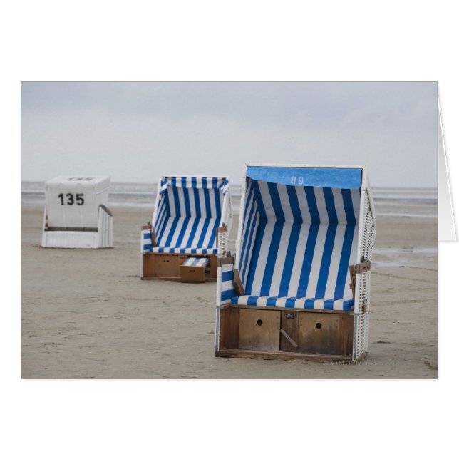 empty beach chairs on beach (Front Horizontal)
