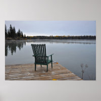 Empty chair on lake deck