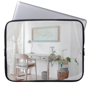 EMPTY DESK NEAR CURTAIN LAPTOP SLEEVE