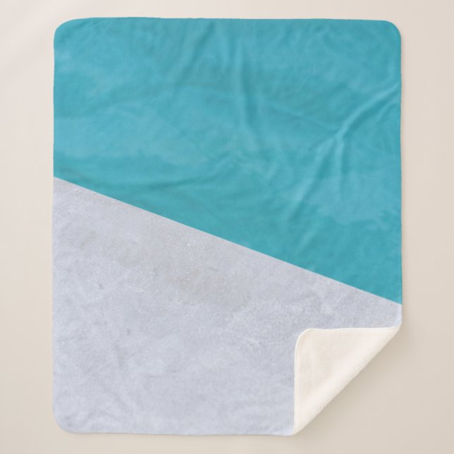 Empty gray floor beside pool sherpa blanket (Front)