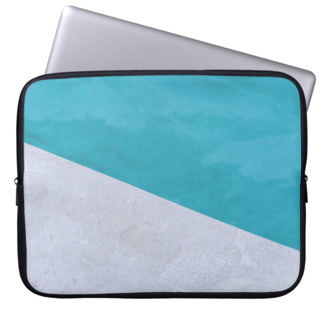 Empty grey floor beside pool laptop sleeve (Front)