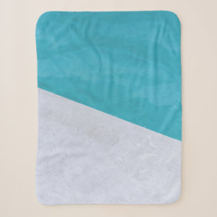 Empty grey floor beside pool sherpa blanket