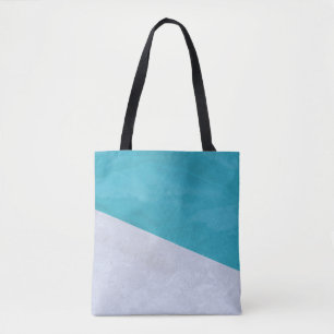 Empty grey floor beside pool tote bag
