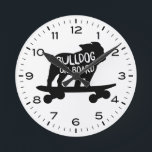English Bulldog Riding Skateboard Bulldog on Board Round Clock<br><div class="desc">An original wall clock for the home or office. Makes a cool gift for Bulldog lovers! Check out Jenn’s Doodle World for even more decorative clocks and dog breed themed home decor.</div>