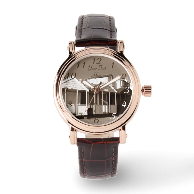 english seaside blue skies and beach huts watch (Front)