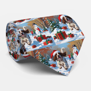 English Setter Running in Snow with Christmas Hat Tie