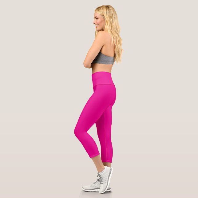 Enhance Your Space with a Pink Background Capri Leggings (Left)