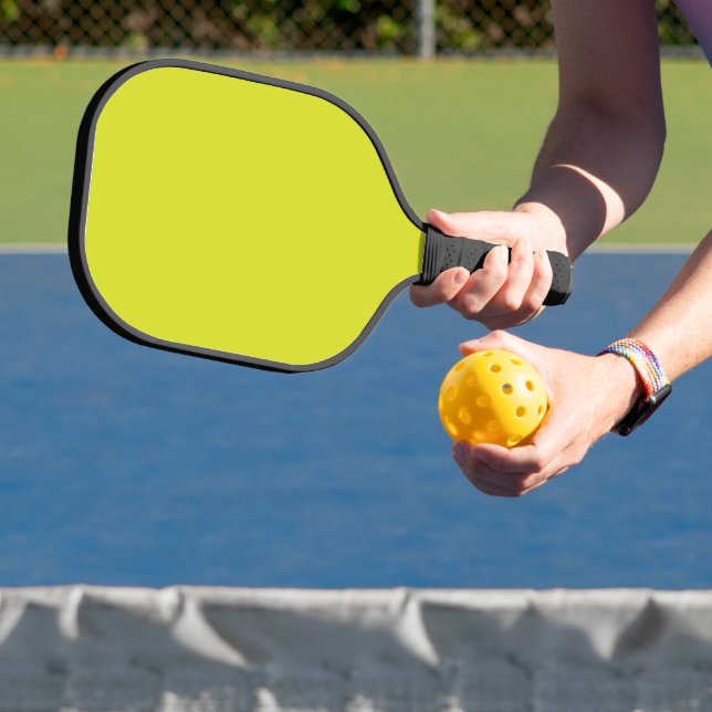 Enhance Your Website Design a Yellow Background Pickleball Paddle (Insitu)
