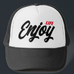 Enjoy Life trucker hat<br><div class="desc">Enjoy Life trucker hat. Custom black and white baseball cap with script typography. Stylish hand lettering design. Available in cool colours. Add your own inspirational quote or saying optionally. Fun summer Birthday gift idea for friends and family.</div>