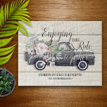 Enjoying the Ride Pink Floral Personalised Jigsaw Puzzle<br><div class="desc">A lovely faux sun bleached wooden background,  classic country step-side vintage truck filled with lovely watercolor flowers and sprays of eucalyptus leaves,  and the sentiment "Enjoying the ride together" with the bride and groom's names and "established" date.  This fun jigsaw puzzle makes the perfect newlywed,  housewarming or anniversary gift.</div>