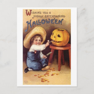 Entertaining Halloween Boy Carving Pumpkin Postcard