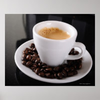 Espresso cup on black granite counter