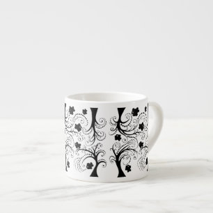 Espresso cup with little whimsical black fishes