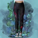 Ethereal Glow Jellyfish Leggings<br><div class="desc">Dive into the depths of style with our Ethereal Glow Jellyfish Leggings. These leggings feature a mesmerising print of glowing jellyfish, set against a deep black background. The vibrant hues of red and teal jellyfish create an enchanting and mysterious allure, perfect for making a bold fashion statement.</div>