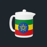 Ethiopia Flag Teapot<br><div class="desc">This Ethiopia Flag Teapot combines functionality with national pride, offering a beautiful way to serve your favourite tea while celebrating the vibrant colours and symbolism of the Ethiopian flag. The teapot features the iconic green, yellow, and red colours of the flag, along with the blue circle and star emblem, making...</div>