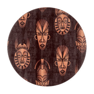 Ethnic African masks, dark background Cutting Board