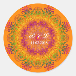 Ethnic floral mandala on orange background. classic round sticker