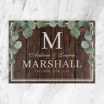 Eucalyptus Greenery Dark Wood Couple Wedding Gift Cutting Board<br><div class="desc">Rustic dark brown wood with eucalyptus greenery cutting board with the couples first names,  last name monogram,  full last name,  and wedding date available in customizable templates.  A cute country barbecue themed gift to help celebrate a summer wedding cookout.</div>