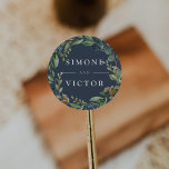 Eucalyptus Grove | Botanical Wreath Wedding Classic Round Sticker<br><div class="desc">Seal your invitation envelopes or favours with these elegant botanical wedding stickers featuring your names in white,  framed by a watercolor wreath of green eucalyptus foliage,  leaves and tiny navy blue buds on a smoky blue background. Coordinates with our Eucalyptus Grove wedding collection.</div>