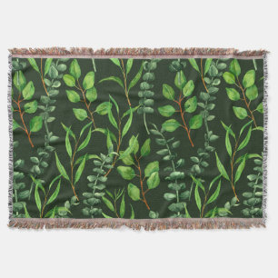 Eucalyptus  on dark green throw blanket