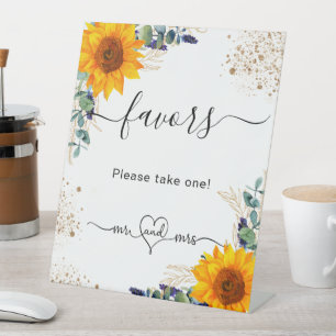 Eucalyptus sunflowers wedding favours guests pedestal sign