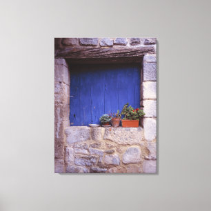 Europe, France, Cereste. A blue door adds colour Canvas Print